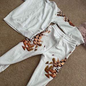 Burberry sweatsuit excellent condition size 12 in little girl